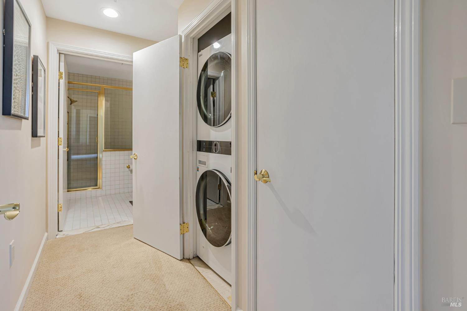 300 Deer Valley Road, Unit 3P San Rafael, CA 94903 - Photo 17 of 23 a utility room with dryer and washer