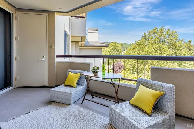 a living room with furniture and a rug