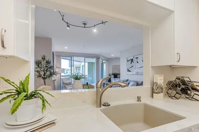 a view of a living room and dining room