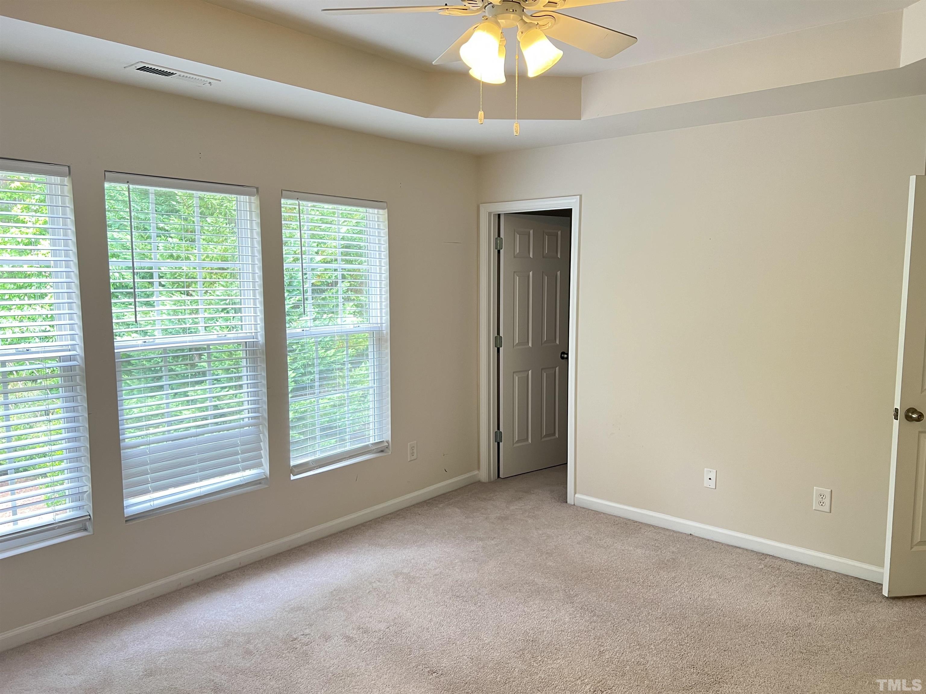 7110 Racine Way Raleigh, NC 27615 - Photo 14 of 19 a view of an empty room with a window
