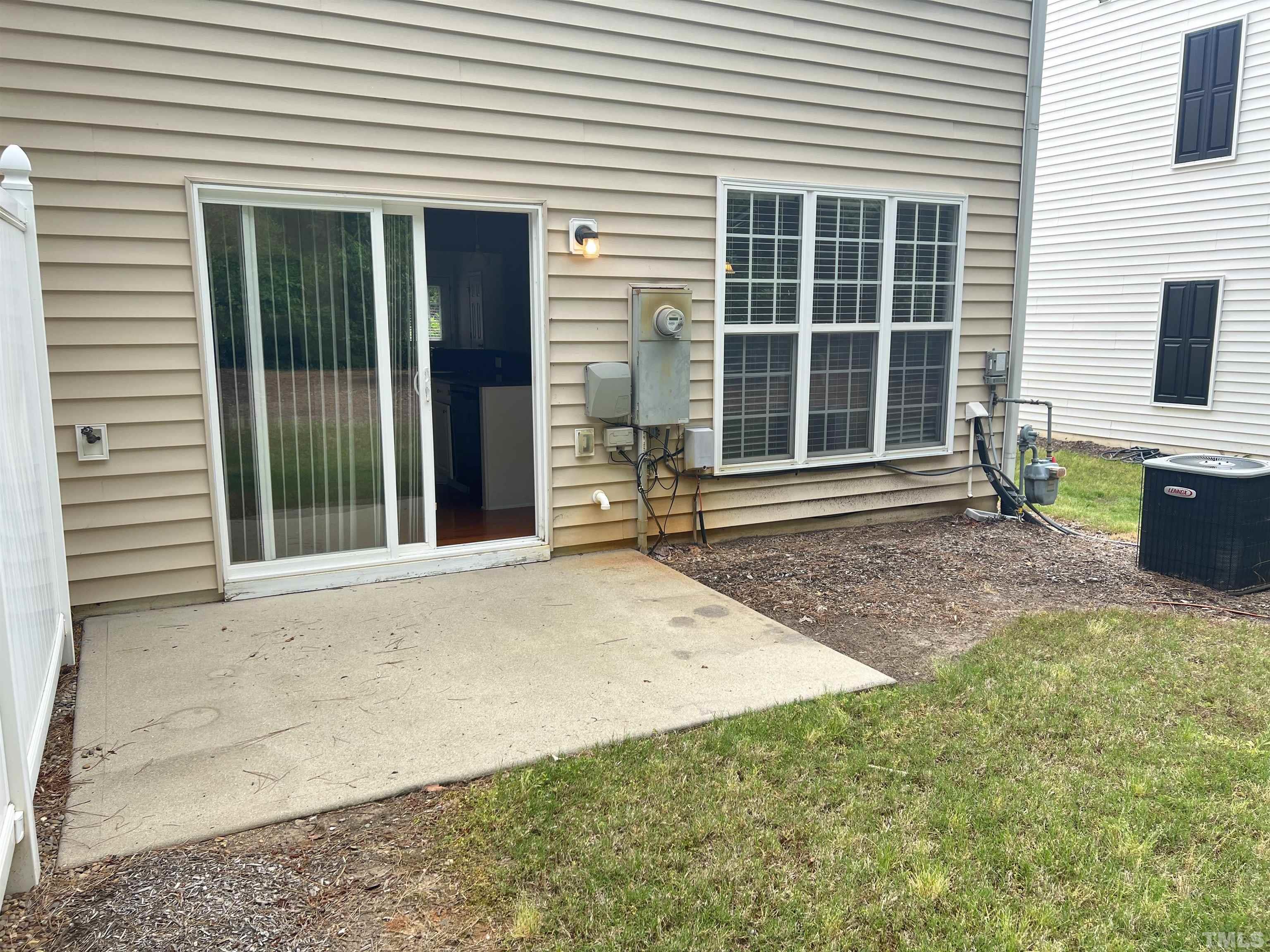 7110 Racine Way Raleigh, NC 27615 - Photo 19 of 19 a front view of a house with a large window