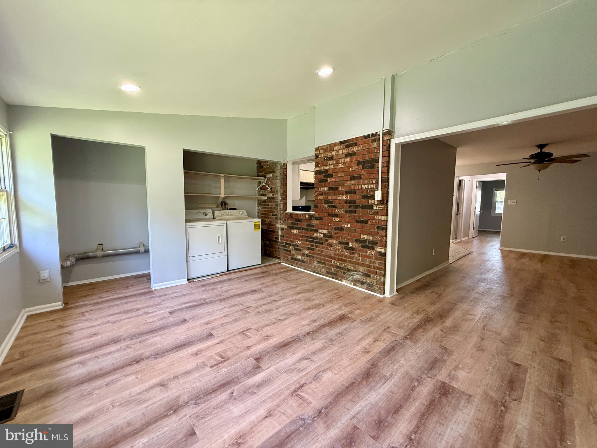 701 Harrison Street Riverside, NJ 08075 - Photo 14 of 26 a view of a kitchen with a sink and a refrigerator