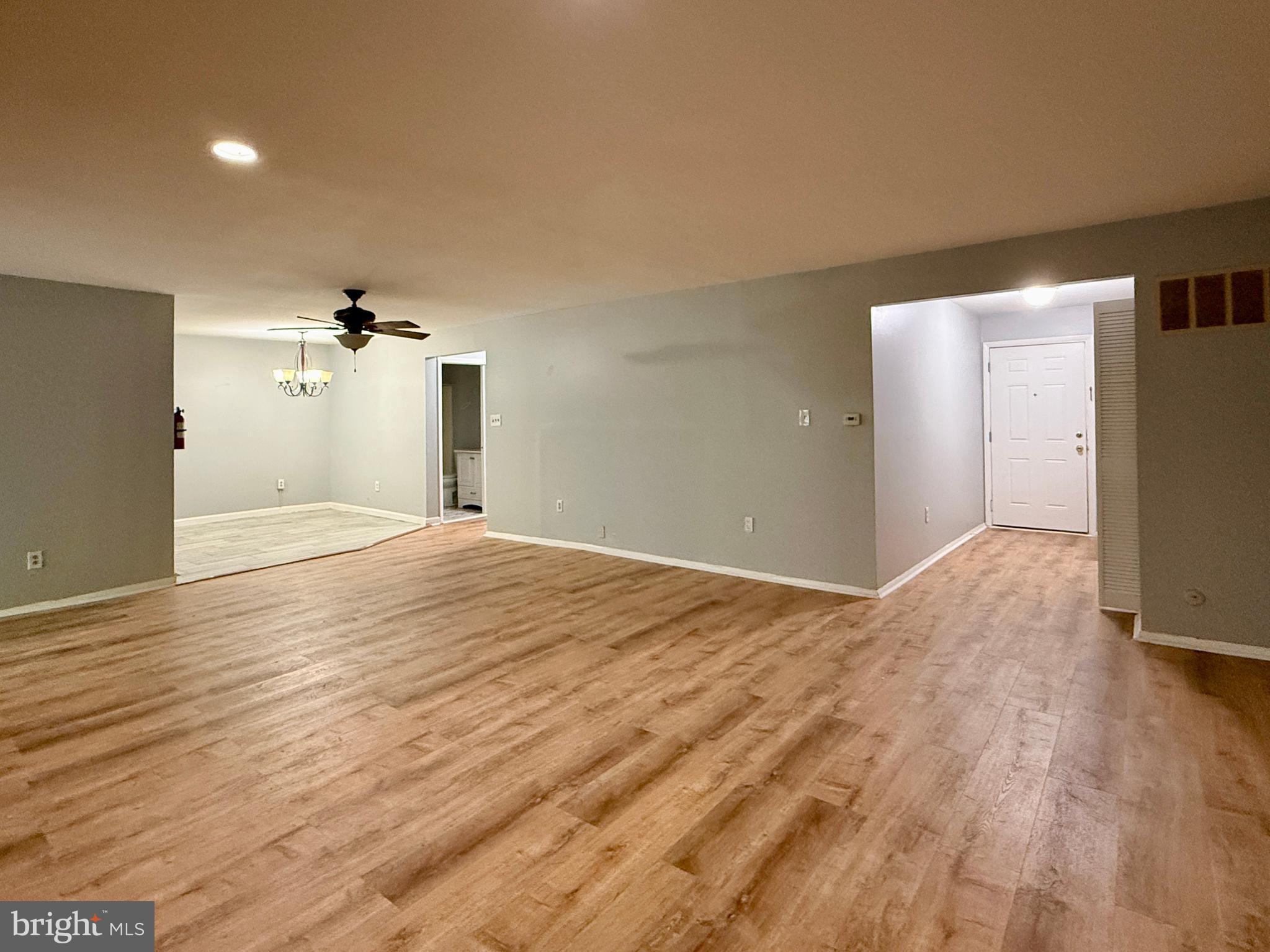 701 Harrison Street Riverside, NJ 08075 - Photo 16 of 26 a view of empty room with wooden floor