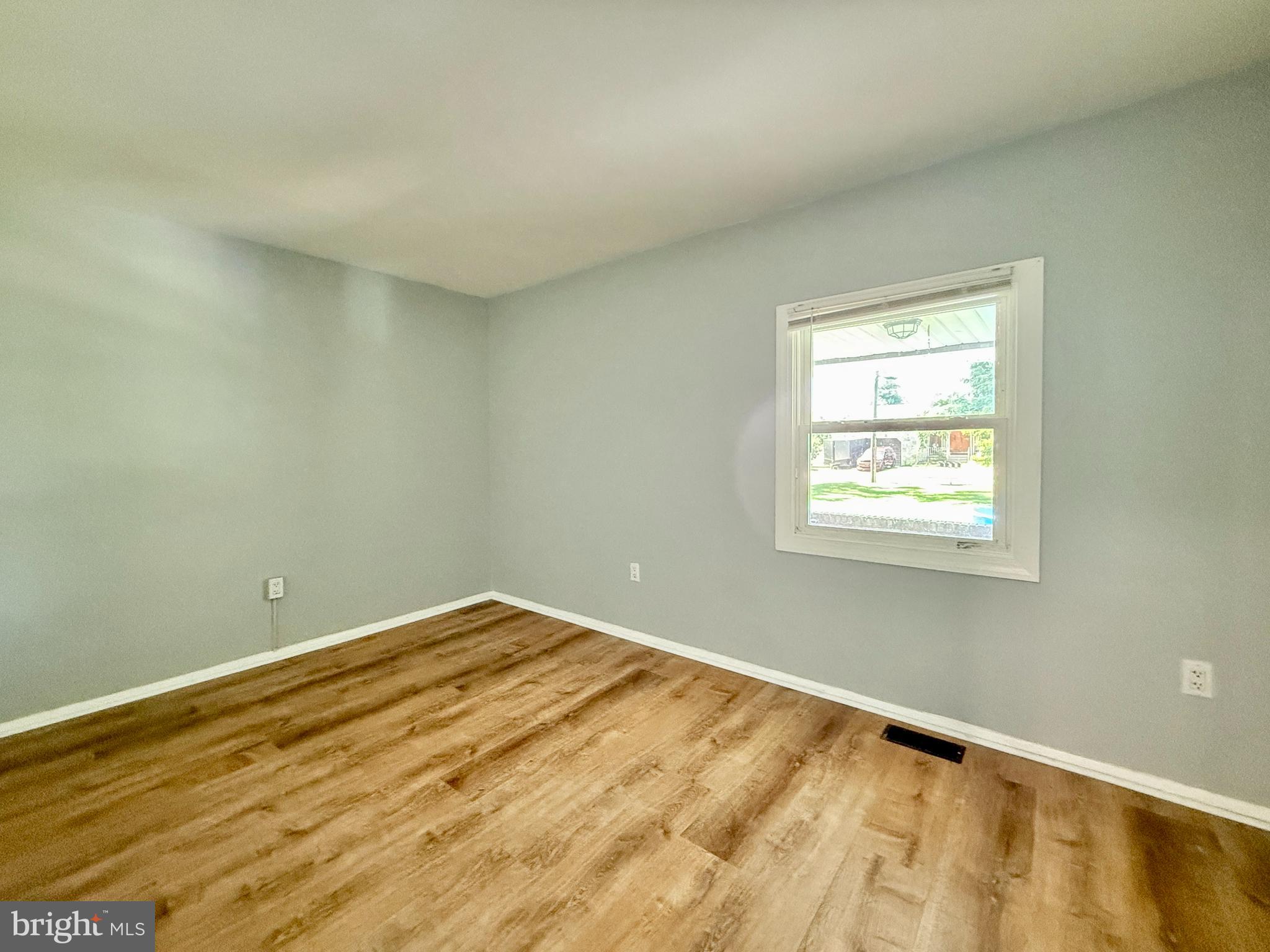 701 Harrison Street Riverside, NJ 08075 - Photo 23 of 26 an empty room with a window