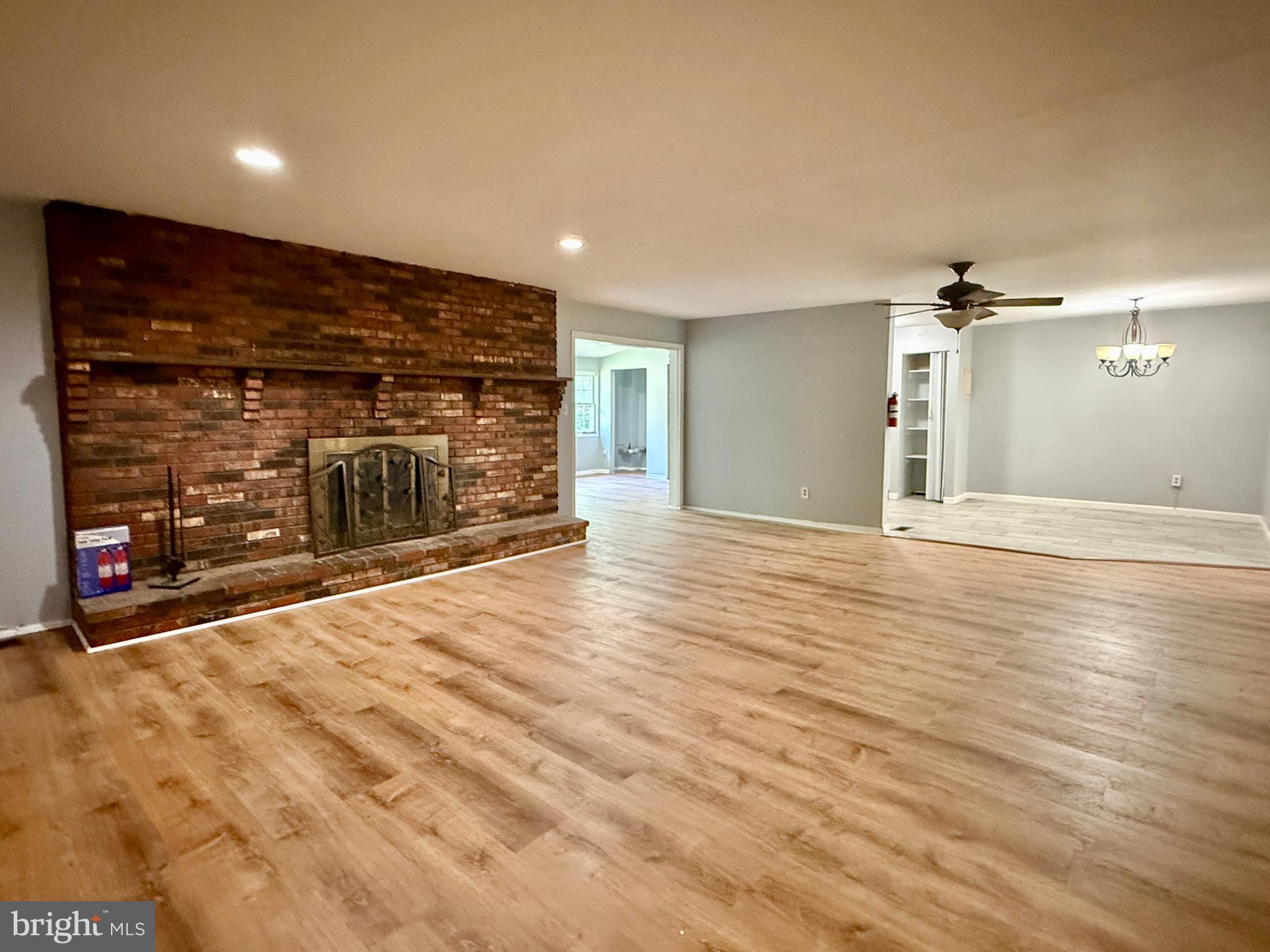701 Harrison Street Riverside, NJ 08075 - Photo 4 of 26 a view of a livingroom with a fireplace