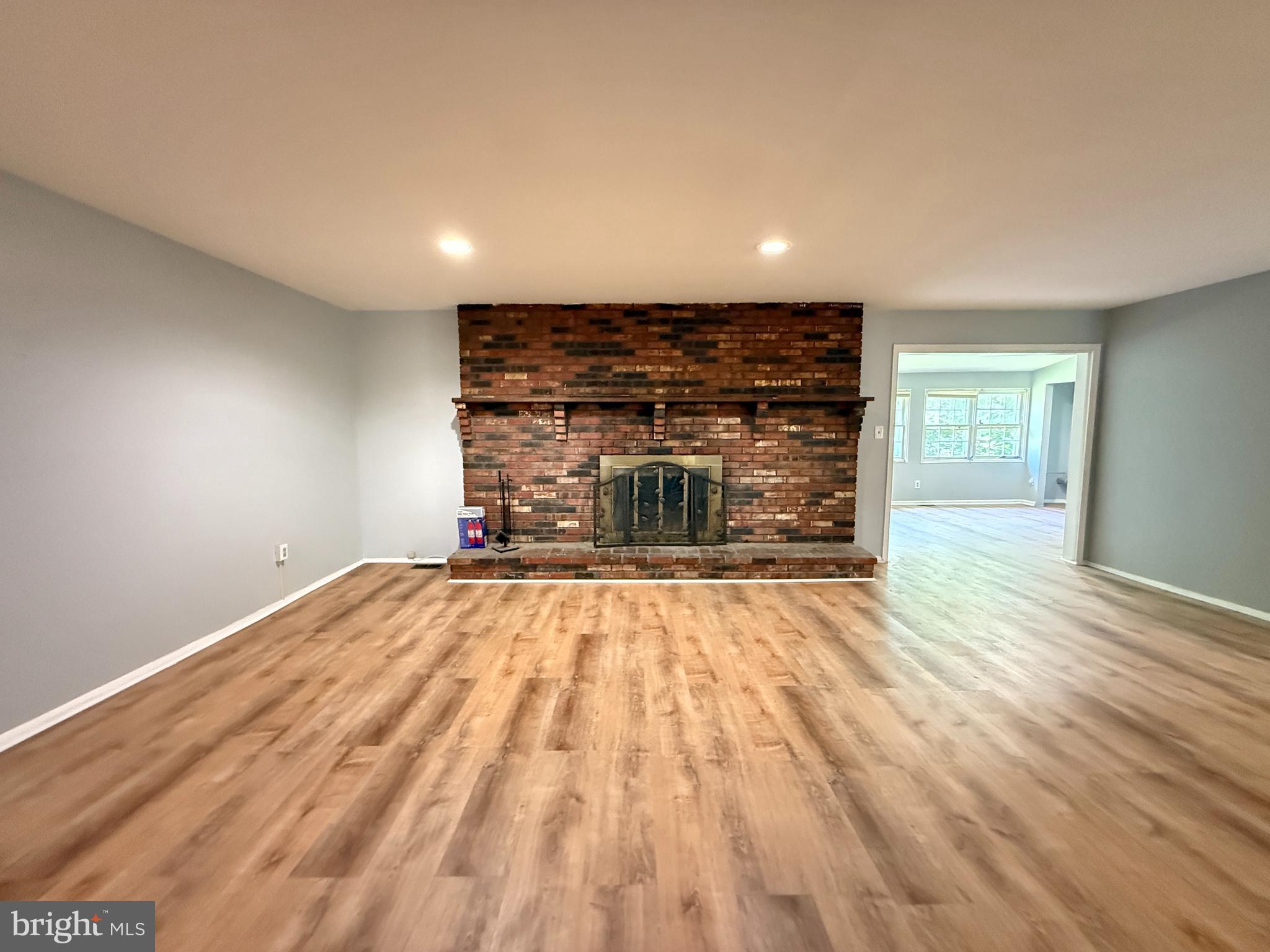 701 Harrison Street Riverside, NJ 08075 - Photo 5 of 26 a view of empty room with wooden floor