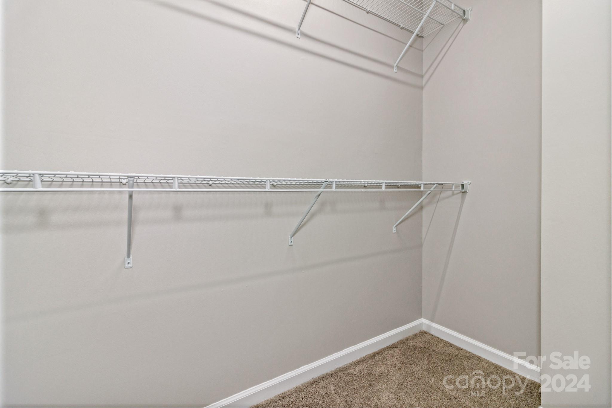 122 Kings Ridge Road Maggie Valley, NC 28751 - Photo 29 of 47 a view of a room with racks on the wall