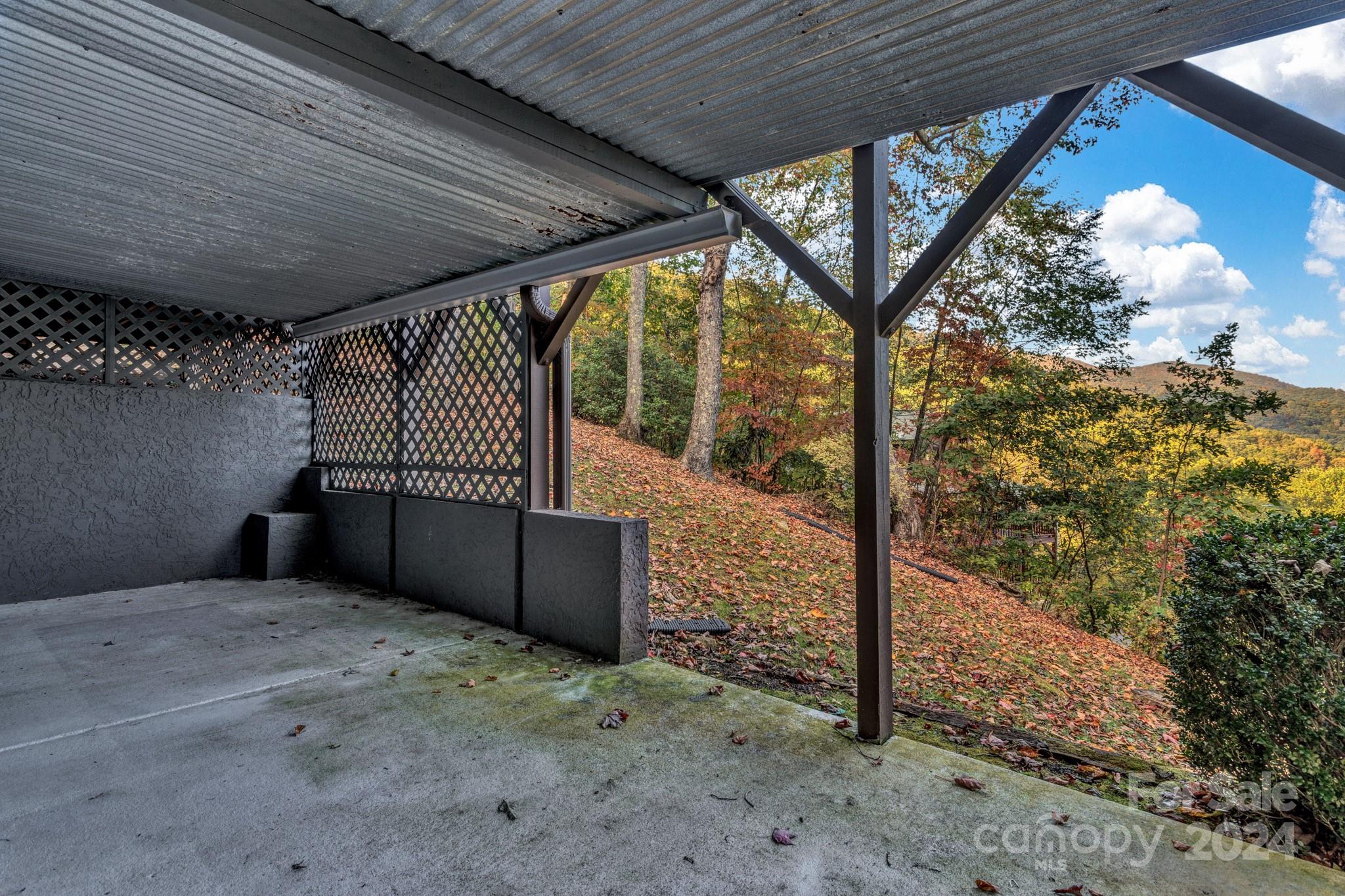 122 Kings Ridge Road Maggie Valley, NC 28751 - Photo 38 of 47 a view of a porch