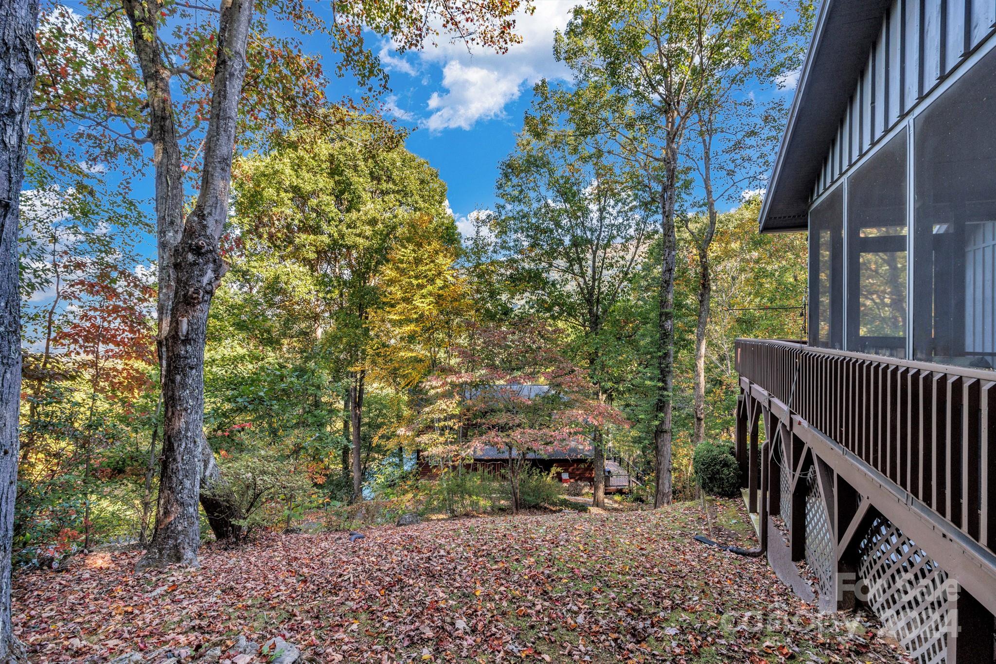 122 Kings Ridge Road Maggie Valley, NC 28751 - Photo 46 of 47 a view of a porch with a yard