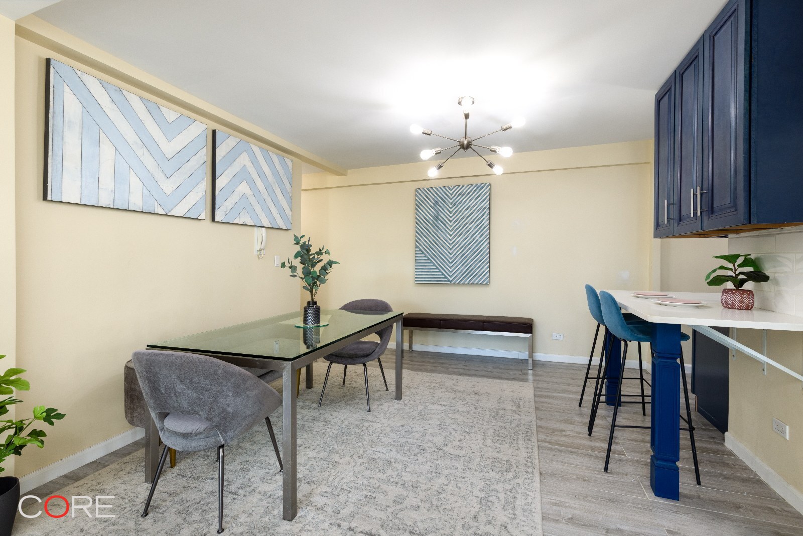 241 East 76th Street, Unit 9I Manhattan, NY 10021 - Photo 2 of 13 a view of a livingroom with furniture and a kitchen