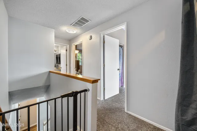 a view of a bedroom from hallway
