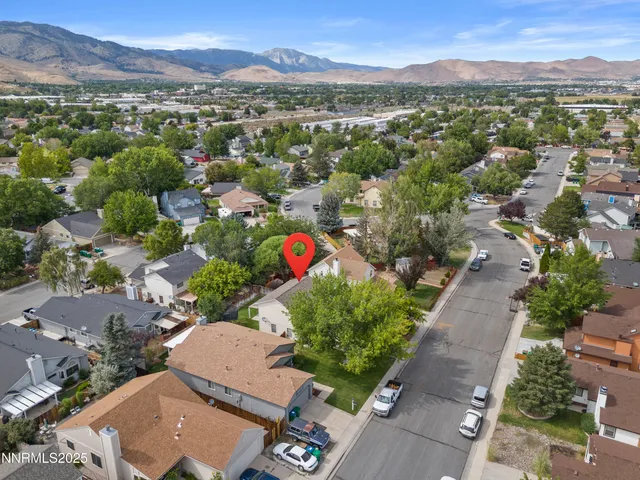 an aerial view of a city with lots of residential buildings