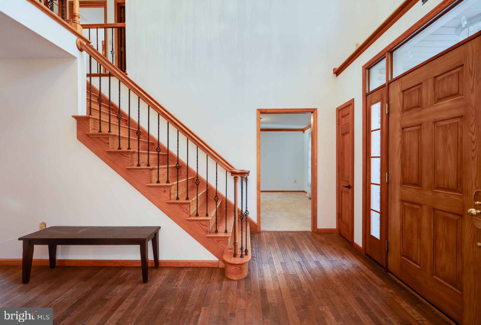 109 Bewley Lane Reading, PA 19605 - Photo 25 of 87 a view of entryway with wooden floor and stairs