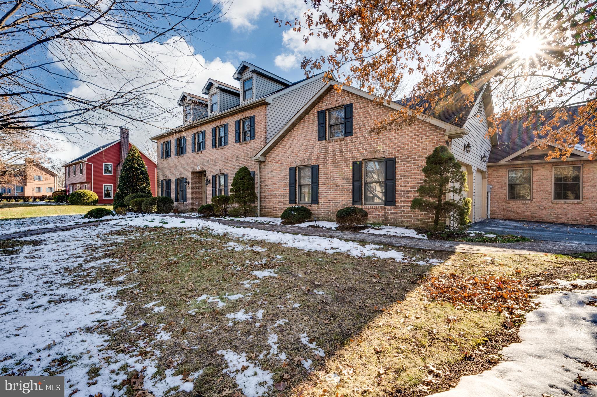 109 Bewley Lane Reading, PA 19605 - Photo 3 of 87 a view of a white house with a yard covered in snow