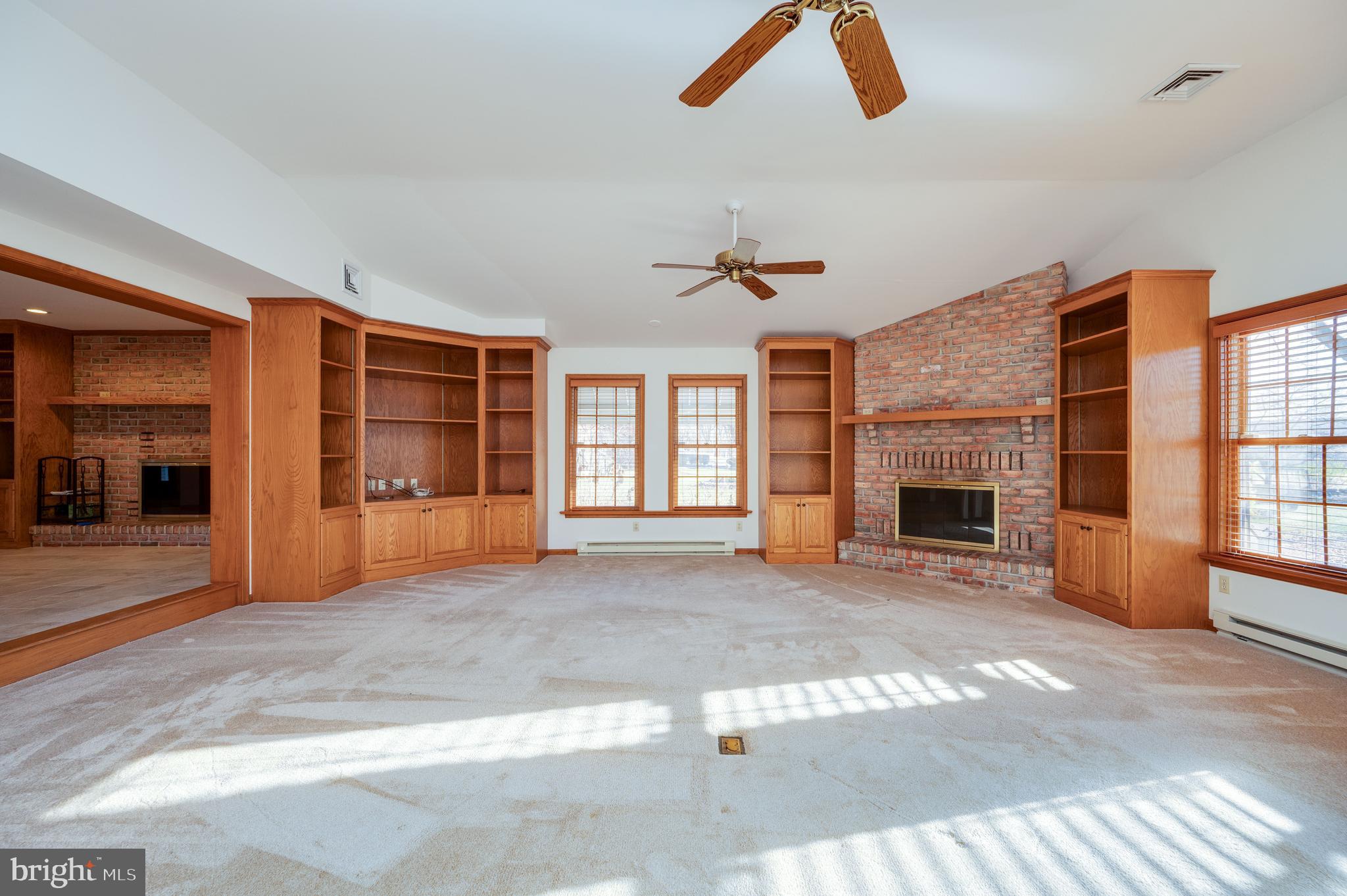 109 Bewley Lane Reading, PA 19605 - Photo 36 of 87 a view of livingroom with fireplace and window