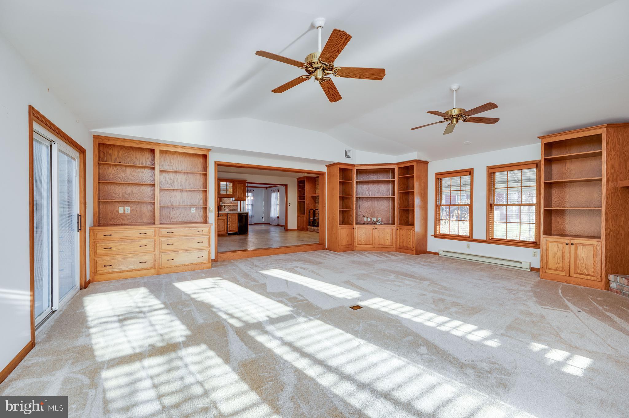 109 Bewley Lane Reading, PA 19605 - Photo 37 of 87 a furnished livingroom with a window and a ceiling fan