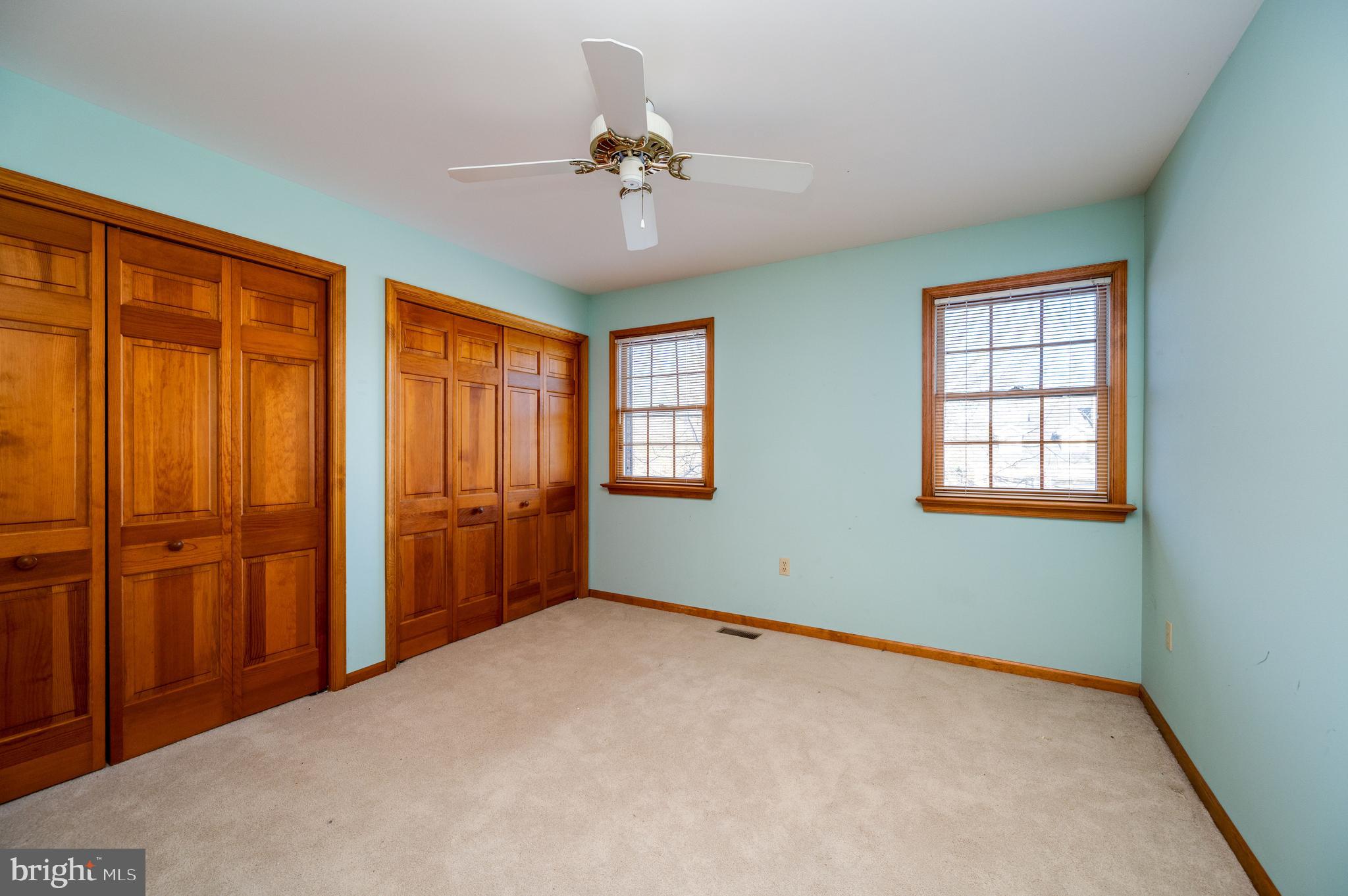 109 Bewley Lane Reading, PA 19605 - Photo 74 of 87 an empty room with chandelier fan and windows