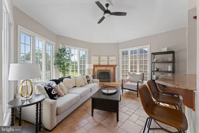 a view of a hallway with a window and stairs