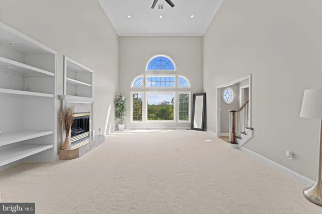 a view of livingroom with furniture and a window