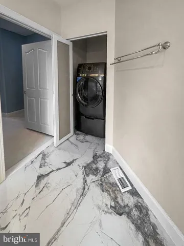 a view of a big yard with a large tree