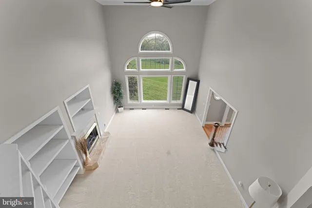 an aerial view of houses with yard