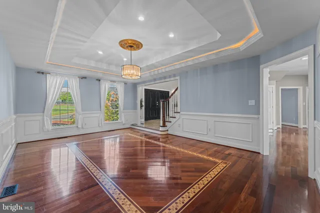 a view of an empty room with a fireplace
