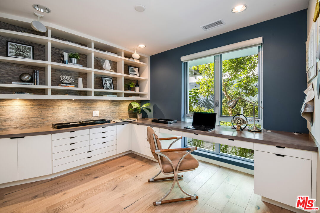 310 Washington Boulevard, Unit 401 Marina del Rey, CA 90292 - Photo 5 of 32 a kitchen with a large window cabinets and furniture