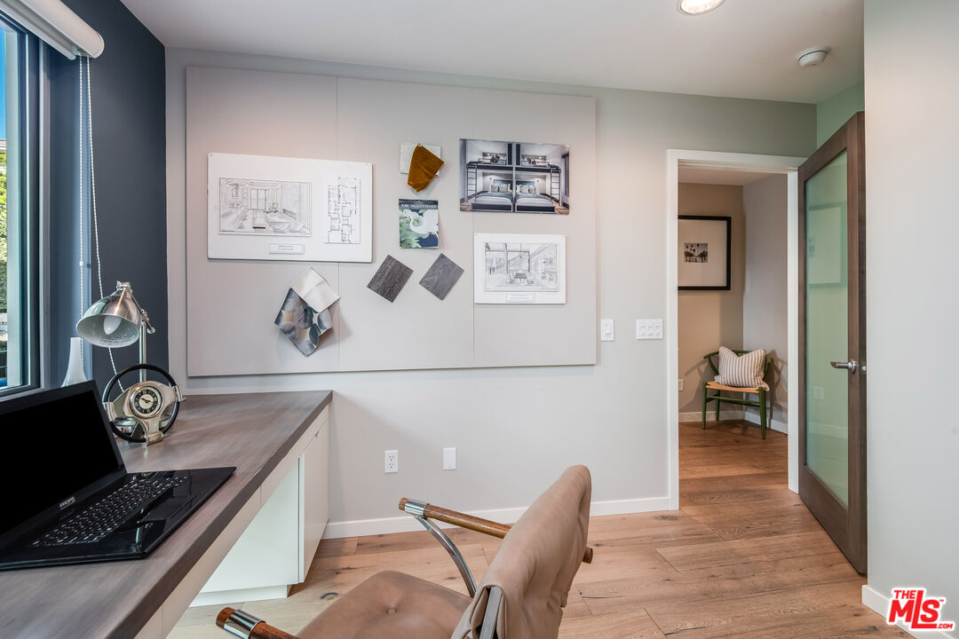 310 Washington Boulevard, Unit 401 Marina del Rey, CA 90292 - Photo 6 of 32 a view of dining room and wooden floor