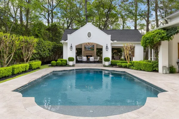a view of a house with swimming pool