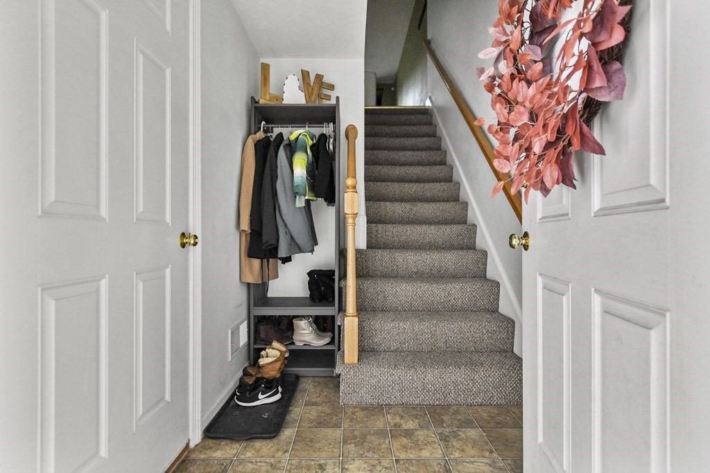 41 Boston Road, Unit 111 Billerica, MA 01862 - Photo 6 of 28 a view of stairs and hardwood floor