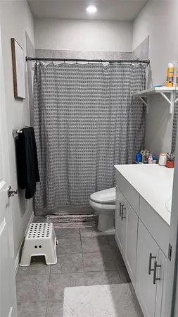 a bed room with a bed and a couch