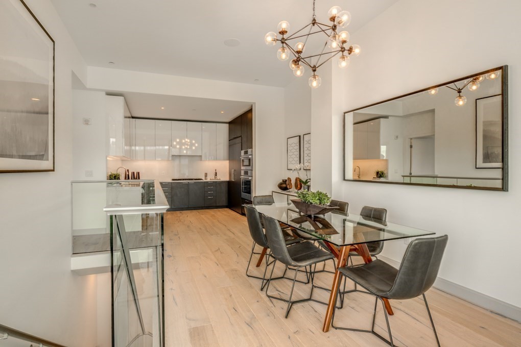 1350 Boylston Street, Unit L415 Boston, MA 02215 - Photo 2 of 16 a view of a dining room with furniture and a chandelier