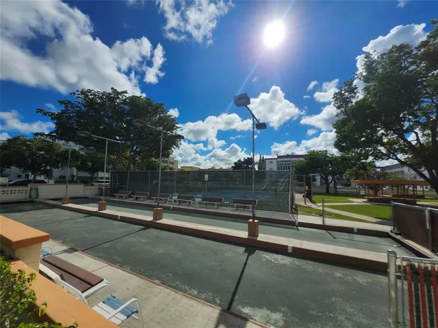 a street sign that is on a wall