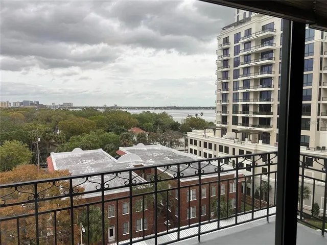 a view of a balcony with an ocean view