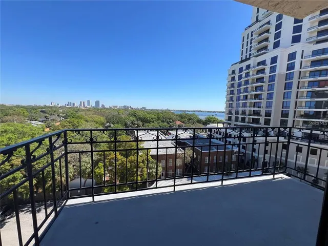 a view of balcony with city