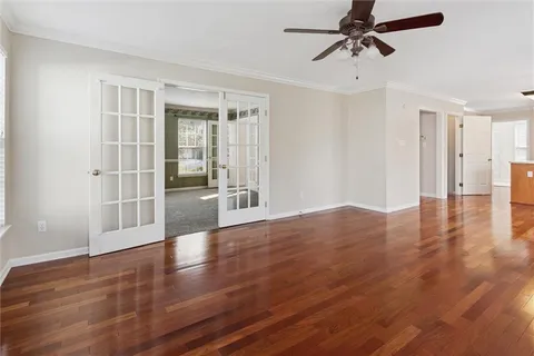 a view of a livingroom with wooden floor