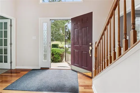 a view of an entryway with staircase