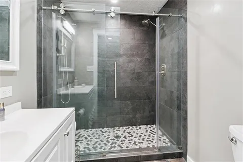 a balcony with wooden floor