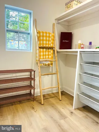 a bathroom with a tub and a shower