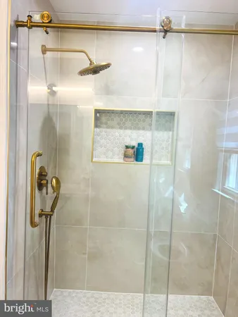 a bedroom with furniture and wooden floor