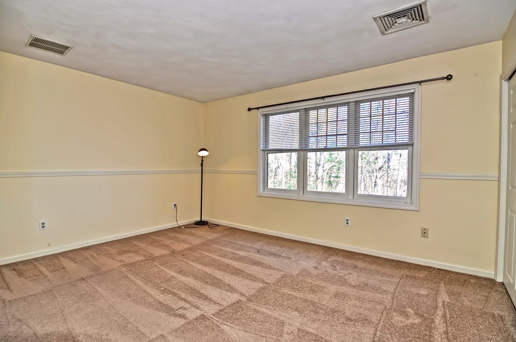 43 Stall Brook Road, Unit 43 Milford, MA 01757 - Photo 15 of 27 a view of an empty room with a window