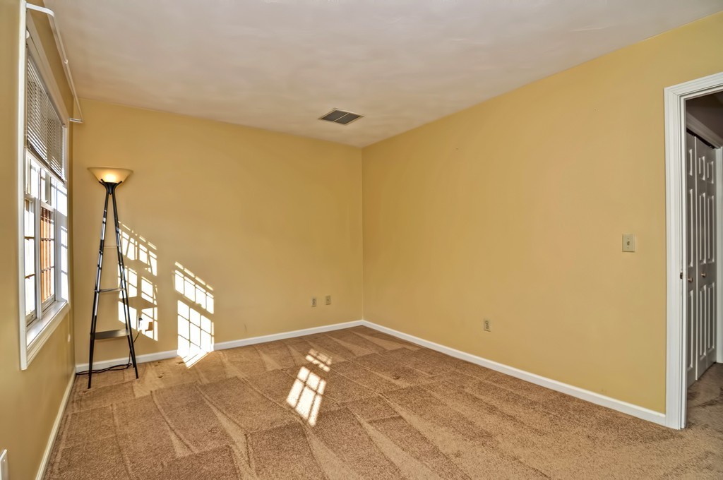 43 Stall Brook Road, Unit 43 Milford, MA 01757 - Photo 17 of 27 a view of a big room with windows