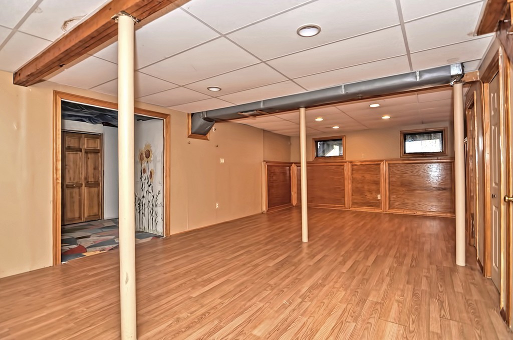 43 Stall Brook Road, Unit 43 Milford, MA 01757 - Photo 22 of 27 a view of empty room with wooden floor