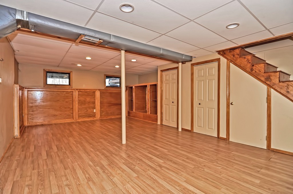 43 Stall Brook Road, Unit 43 Milford, MA 01757 - Photo 23 of 27 a view of an empty room with wooden floor