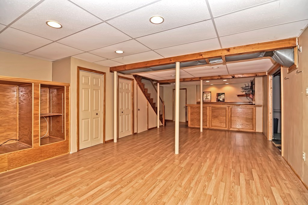 43 Stall Brook Road, Unit 43 Milford, MA 01757 - Photo 24 of 27 a view of empty room with wooden floor