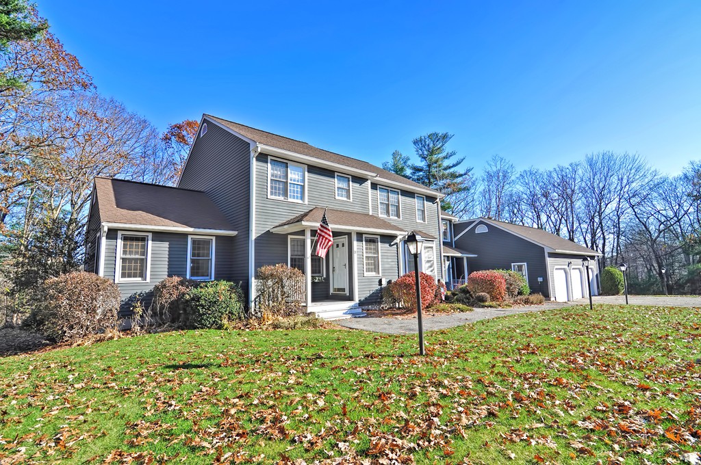 43 Stall Brook Road, Unit 43 Milford, MA 01757 - Photo 27 of 27 a front view of a house with a yard