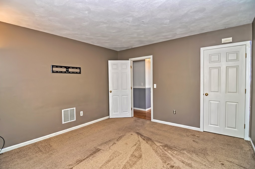 43 Stall Brook Road, Unit 43 Milford, MA 01757 - Photo 10 of 27 a view of a livingroom with an empty space