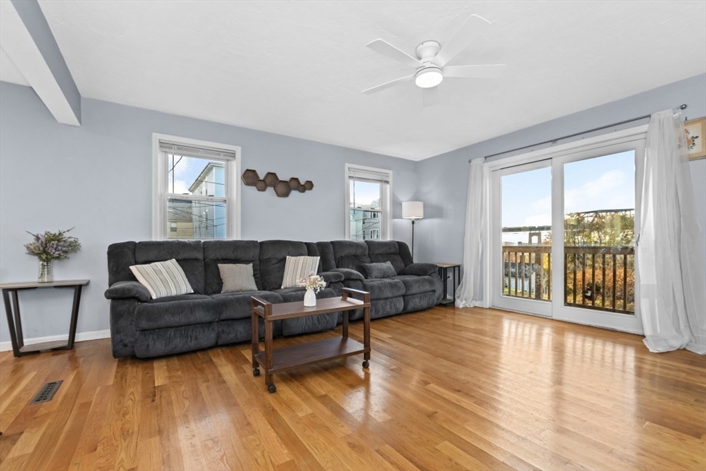 9 Doctor Street Fall River, MA 02720 - Photo 4 of 14 a living room with furniture and a large window
