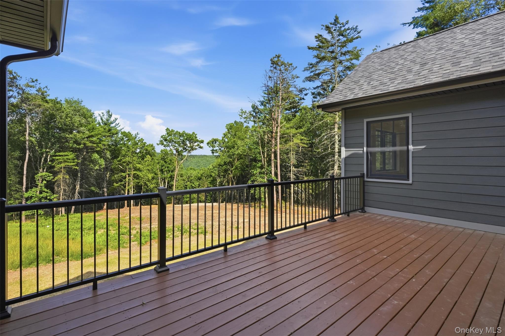 300 Van Tuyl Road Barryville, NY 12719 - Photo 22 of 50 a view of balcony with wooden floor