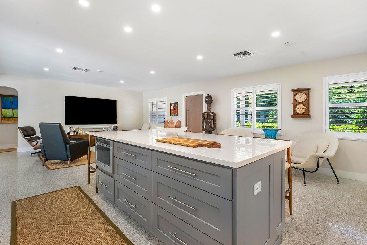 911 Southwest 27th Terrace Boynton Beach, FL 33435 - Photo 10 of 55 Center Island with seating